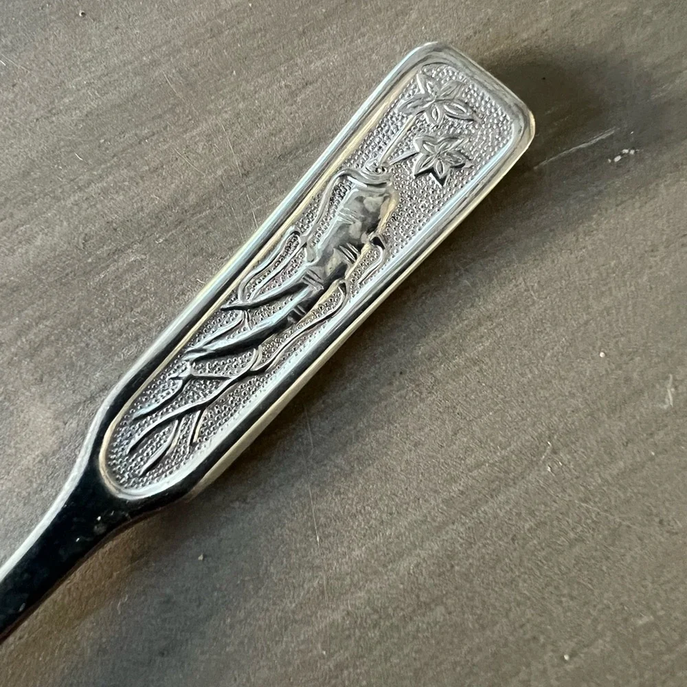 Vintage Korean Stainless Steel Spoon with Engraved Ginseng Root Handle